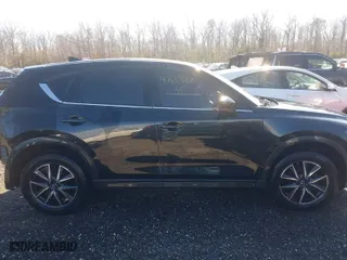 2017 Mazda CX-5 Grand Touring with VIN JM3KFBDL0H0228056, listed as a IAAI auction lot 41611567 with 85,294 mi miles. Bid and sale history available at carsss.com. Image 14.