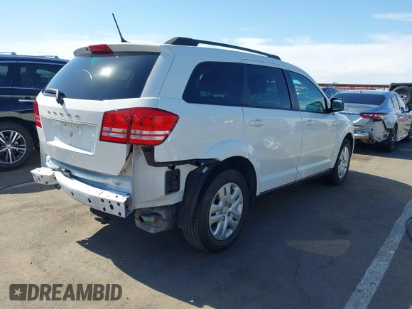2016 Dodge Journey American Value with VIN 3C4PDCAB2GT230608, listed as a IAAI auction lot 42191801 with 115,477 mi miles and . Bid and sale history available at DreamBid. Image 4.