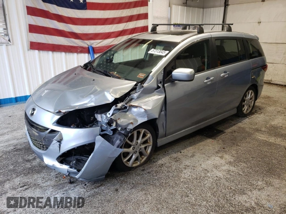 2012 Mazda 5 Touring z VIN JM1CW2CL6C0107720, wystawiony jako Copart lot #57313045 z przebiegiem 112 051 mil mil oraz Szkoda całkowita • Salvage title. Historia ofert i sprzedaży dostępna na DreamBid. Obrazek 1.