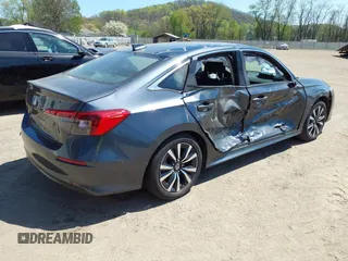 2023 Honda Civic Sedan EX with VIN 2HGFE1F71PH324023, listed as a IAAI auction lot 39256308 with 6,451 mi miles. Bid and sale history available at carsss.com. Image 4.