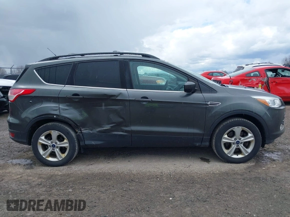 2016 Ford Escape SE with VIN 1FMCU9G92GUC22029, listed as a IAAI auction lot 42032478 with 133,853 mi miles. Bid and sale history available at carsss.com. Image 13.