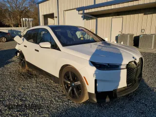 2022 BMW iX xDrive50 with VIN WB523CF02NCJ55045, listed as a Copart auction lot 87017454 with 35,801 mi miles and Salvage Title. Bid and sale history available at carsss.com. Image 4.