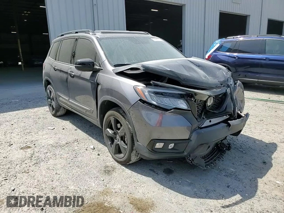 2021 Honda Passport Elite with VIN 5FNYF8H08MB014398, listed as a Copart auction lot 50499375 with 52,550 mi miles and Salvage Title. Bid and sale history available at DreamBid. Image 11.
