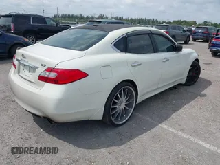 2011 Infiniti M with VIN JN1BY1AP7BM325701, listed as a IAAI auction lot 41861484 with 151,955 mi miles and . Bid and sale history available at DreamBid. Image 4.