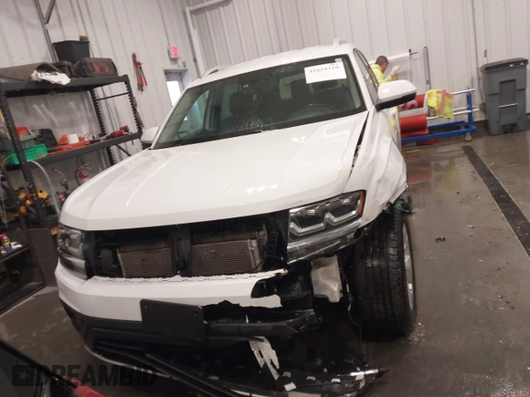 2018 Volkswagen Atlas SE with VIN 1V2KR2CA7JC574270, listed as a IAAI auction lot 41654110 with 104,440 mi miles and . Bid and sale history available at DreamBid. Image 13.