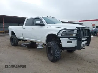 2014 Ram 2500 with VIN 3C6TR5KT3EG309771, listed as a IAAI auction lot 41213964 with 136,617 mi miles and . Bid and sale history available at DreamBid. Image 1.