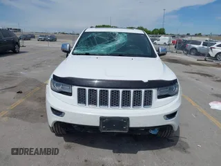 2014 Jeep Grand Cherokee Summit with VIN 1C4RJFJG0EC174871, listed as a IAAI auction lot 42341312 with 170,743 mi miles and . Bid and sale history available at DreamBid. Image 13.