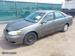 2004 Toyota Camry LE with VIN 4T1BE32K04U853924, listed as a IAAI auction lot 42114407 with 246,272 mi miles. Bid and sale history available at carsss.com. Image 2.