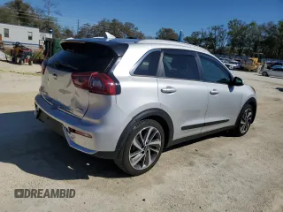 2019 Kia Niro Touring with VIN KNDCE3LC4K5215974, listed as a Copart auction lot 48774205 with 59,080 mi miles and Non Repairable. Bid and sale history available at carsss.com. Image 3.