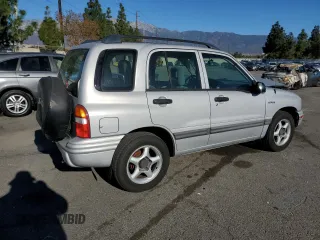 2002 Suzuki Vitara JLS z VIN 2S3TE52V126109079, wystawiony jako Copart lot #41477725 z przebiegiem 147 255 mil mil oraz Szkody całkowita. Historia ofert i sprzedaży dostępna na DreamBid. Obrazek 3.