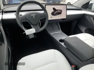 2025 Tesla Model Y Long Range with VIN 7SAYGDED8SF277469, listed as a Copart auction lot 45600195 with 442 mi miles and Salvage Title. Bid and sale history available at DreamBid. Image 8.