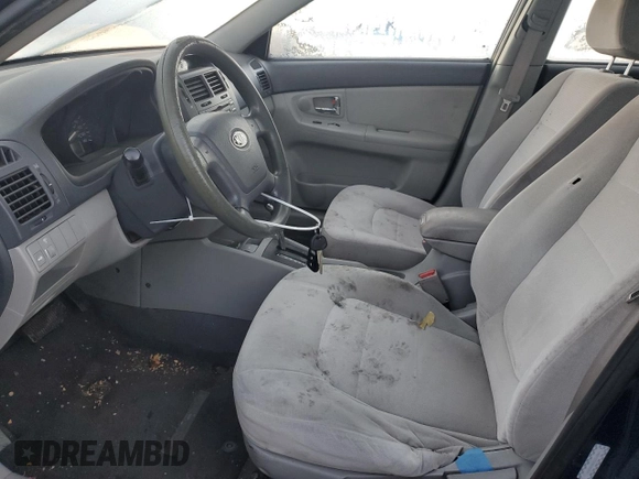 2008 Kia Spectra EX with VIN KNAFE122885583042, listed as a Copart auction lot 83485024 with 171,795 mi miles and Salvage title. Bid and sale history available at DreamBid. Image 7.