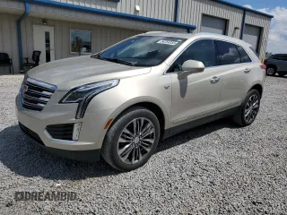 2017 Cadillac XT5 Premium Luxury FWD z VIN 1GYKNCRS7HZ121755, wystawiony jako Copart lot #54354055 z przebiegiem 63 000 mil mil oraz Szkoda całkowita • Salvage title. Historia ofert i sprzedaży dostępna na DreamBid. Obrazek 1.