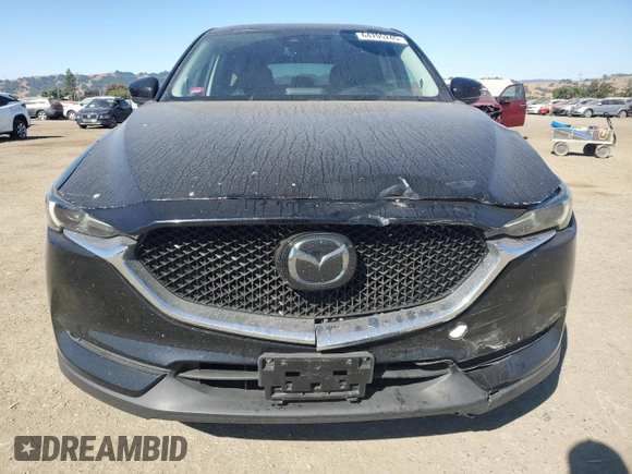 2018 Mazda CX-5 Grand Touring с VIN JM3KFADM2J1310339, выставлен на аукционе Copart как лот 64705245 с пробегом 63 927 миль миль и Списание • Salvage title. История ставок и продаж доступна на DreamBid. Изображение 5.