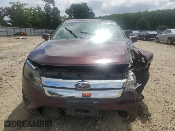 2012 Ford Fusion SE with VIN 3FAHP0HA1CR353479, listed as a Copart auction lot 59677935 with 27,727 mi miles and Salvage title. Bid and sale history available at DreamBid. Image 5.