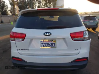 2018 Kia Sorento LX with VIN 5XYPG4A52JG354741, listed as a IAAI auction lot 41626561 with 91,242 mi miles and . Bid and sale history available at DreamBid. Image 17.