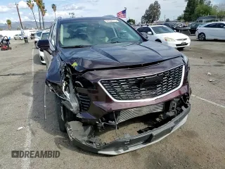 2020 Cadillac XT4 FWD Premium Luxury with VIN 1GYFZCR46LF112188, listed as a Copart auction lot 51536115 with 31,427 mi miles and Salvage title. Bid and sale history available at DreamBid. Image 12.