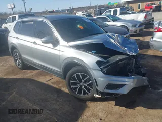 2021 Volkswagen Tiguan SE z VIN 3VV3B7AX5MM068312, wystawiony jako IAAI lot #41781250 z przebiegiem 75 213 mil mil oraz . Historia ofert i sprzedaży dostępna na DreamBid. Obrazek 1.
