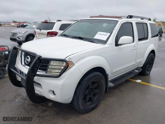 2005 Nissan Pathfinder LE with VIN 5N1AR18W05C768507, listed as a IAAI auction lot 41869604 with 222,459 mi miles. Bid and sale history available at carsss.com. Image 2.