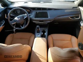 2021 Cadillac XT4 FWD Premium Luxury z VIN 1GYFZCR45MF080027, wystawiony jako Copart lot #46195835 z przebiegiem Nie podano mil oraz Nie do naprawy • Non repairable. Historia ofert i sprzedaży dostępna na DreamBid. Obrazek 8.