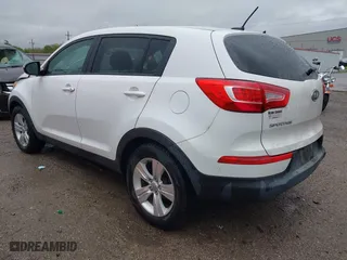 2012 Kia Sportage LX with VIN KNDPB3A2XC7283612, listed as a IAAI auction lot 41957810 with 165,899 mi miles. Bid and sale history available at carsss.com. Image 3.