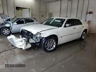 2006 Chrysler 300 C z VIN 2C3LA63H06H171371, wystawiony jako Copart lot #57614735 z przebiegiem Nie podano mil oraz Szkoda całkowita • Salvage title. Historia ofert i sprzedaży dostępna na DreamBid. Obrazek 1.