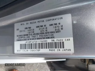 2014 Mazda 3 i Grand Touring with VIN JM1BM1W72E1196080, listed as a IAAI auction lot 42002800 with 88,772 mi miles. Bid and sale history available at carsss.com. Image 9.