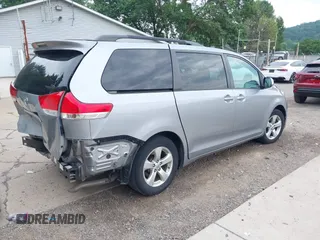 2013 Toyota Sienna LE AAS with VIN 5TDKK3DC7DS332092, listed as a IAAI auction lot 42676665 with 121,481 mi miles and . Bid and sale history available at DreamBid. Image 4.