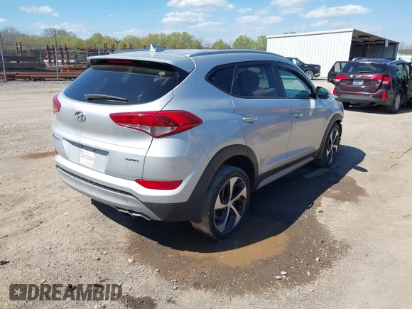 2018 Hyundai Tucson Sport with VIN KM8J33AL1JU817635, listed as a IAAI auction lot 41889913 with 78,255 mi miles. Bid and sale history available at carsss.com. Image 4.
