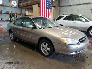 2003 Ford Taurus SES Standard with VIN 1FAFP55S23A183399, listed as a Copart auction lot 59362035 with 112,889 mi miles and Salvage title. Bid and sale history available at DreamBid. Image 4.