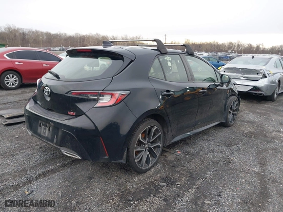 2021 Toyota Corolla Hatchback XSE with VIN JTNC4MBE5M3106428, listed as a IAAI auction lot 41497937 with 94,951 mi miles. Bid and sale history available at carsss.com. Image 4.