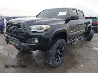 2017 Toyota Tacoma SR5 with VIN 5TFCZ5AN6HX076769, listed as a IAAI auction lot 41889869 with 208,894 mi miles. Bid and sale history available at carsss.com. Image 2.