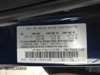 2014 Mazda 3 i Touring with VIN JM1BM1V76E1113185, listed as a IAAI auction lot 41610966 with 77,697 mi miles and . Bid and sale history available at DreamBid. Image 9.