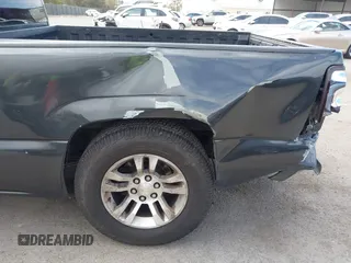 2004 Chevrolet Silverado 1500 LS with VIN 2GCEC19V241233129, listed as a IAAI auction lot 42068152 with 220,636 mi miles and . Bid and sale history available at DreamBid. Image 13.