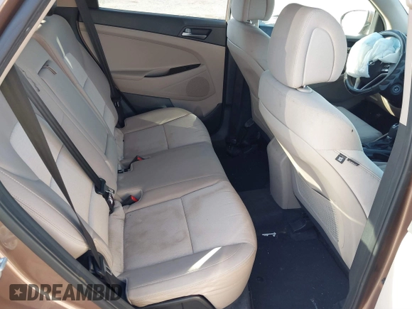 2017 Hyundai Tucson SE with VIN KM8J23A40HU525982, listed as a IAAI auction lot 41790898 with 107,715 mi miles. Bid and sale history available at carsss.com. Image 8.