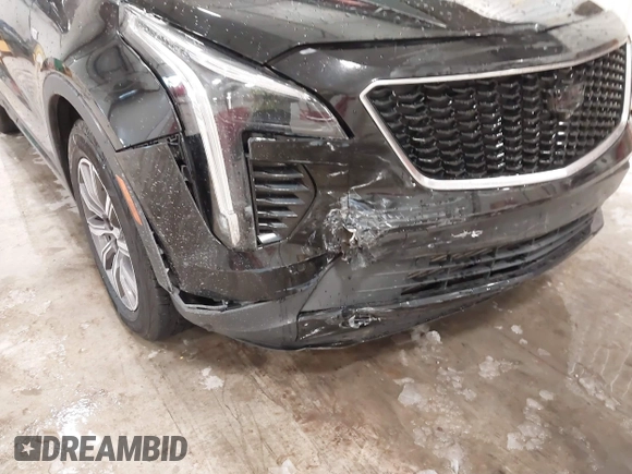 2020 Cadillac XT4 AWD Sport with VIN 1GYFZFR43LF090264, listed as a IAAI auction lot 41261586 with 65,859 mi miles and . Bid and sale history available at DreamBid. Image 6.