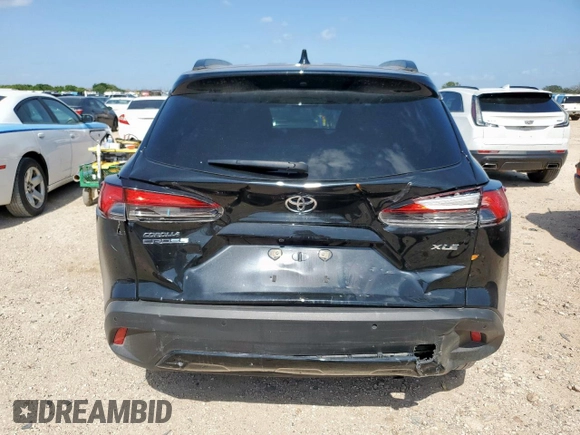 2023 Toyota Corolla Cross XLE with VIN 7MUDAAAG2PV072301, listed as a Copart auction lot 61547155 with 25,017 mi miles and Salvage title. Bid and sale history available at DreamBid. Image 6.