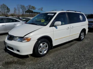 2000 Honda Odyssey EX with VIN 2HKRL1861YH564896, listed as a Copart auction lot 50635805 with 156,313 mi miles and Salvage Title. Bid and sale history available at DreamBid. Image 1.