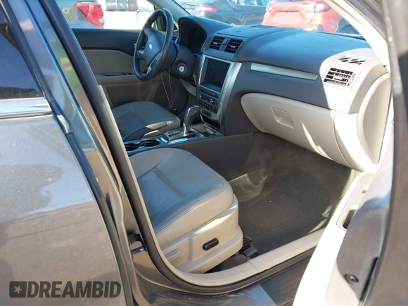 2010 Ford Fusion Hybrid z VIN 3FADP0L35AR423330, wystawiony jako IAAI lot #41972619 z przebiegiem 154 026 mil mil oraz . Historia ofert i sprzedaży dostępna na DreamBid. Obrazek 5.