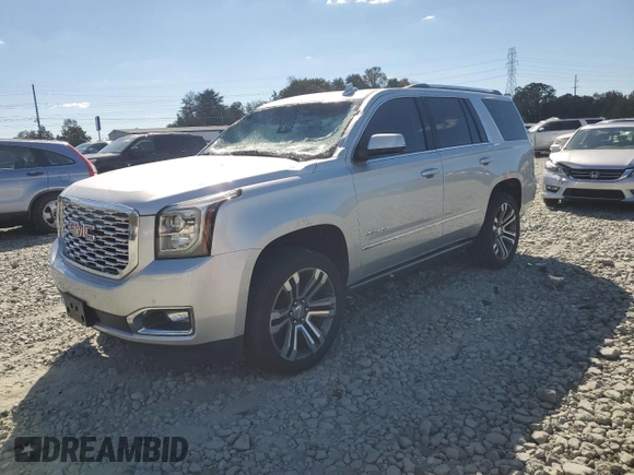 2020 GMC Yukon Denali with VIN 1GKS2CKJ1LR112319, listed as a Copart auction lot 75936154 with 112,187 mi miles and Salvage Title. Bid and sale history available at carsss.com. Image 1.