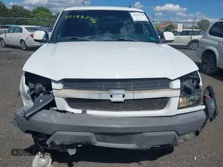 2002 Chevrolet Avalanche with VIN 3GNEC13T92G265370, listed as a IAAI auction lot 42197376 with Not Provided miles and . Bid and sale history available at DreamBid. Image 6.