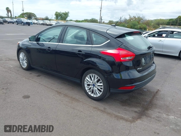 2017 Ford Focus Titanium z VIN 1FADP3N24HL326330, wystawiony jako IAAI lot #42594927 z przebiegiem 54 727 mil mil oraz . Historia ofert i sprzedaży dostępna na DreamBid. Obrazek 3.