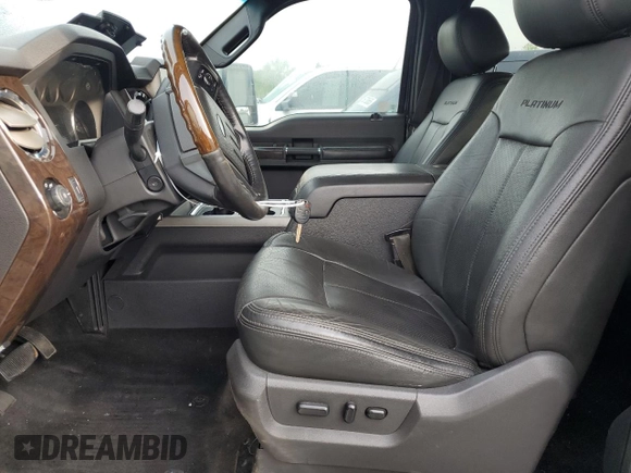 2015 Ford F-250 Lariat with VIN 1FT7W2BT4FEA24992, listed as a Copart auction lot 57040065 with 151,573 mi miles and Salvage title. Bid and sale history available at DreamBid. Image 7.