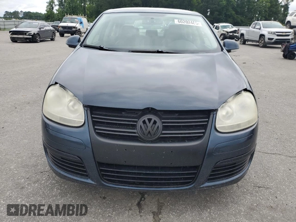 2009 Volkswagen Jetta SE with VIN 3VWRZ71K59M055735, listed as a Copart auction lot 60202485 with 160,196 mi miles and Salvage title. Bid and sale history available at DreamBid. Image 5.