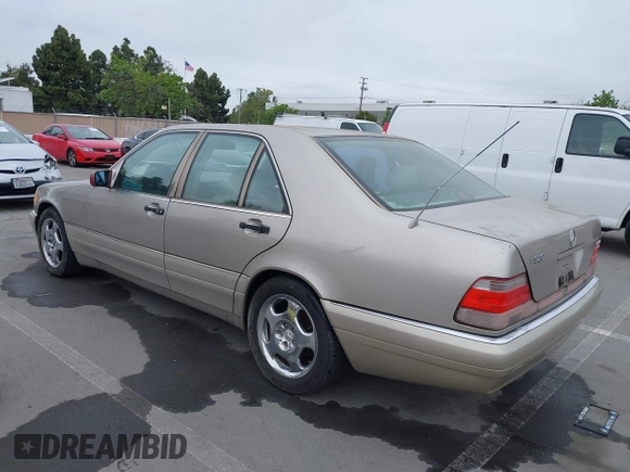 1997 Mercedes-Benz S-Class with VIN WDBGA32G1VA349367, listed as a IAAI auction lot 42079132 with 383,250 mi miles. Bid and sale history available at carsss.com. Image 3.