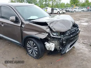2019 Mitsubishi Outlander ES with VIN JA4AZ3A31KZ043372, listed as a IAAI auction lot 42306119 with 195,635 mi miles and . Bid and sale history available at DreamBid. Image 17.