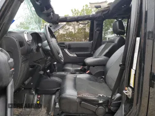 2012 Jeep Wrangler Unlimited Rubicon with VIN 1C4HJWFG7CL205244, listed as a Copart auction lot 86651914 with Not provided miles and Salvage title. Bid and sale history available at DreamBid. Image 7.