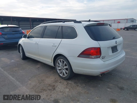 2014 Volkswagen Jetta TDI w/Sunroof & Nav with VIN 3VWPL7AJ7EM617385, listed as a IAAI auction lot 42012881 with 98,015 mi miles and . Bid and sale history available at DreamBid. Image 3.