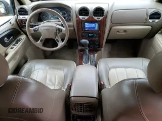 2004 GMC Envoy SLT with VIN 1GKDT13S342262833, listed as a Copart auction lot 87828975 with 203,404 mi miles and Salvage Title. Bid and sale history available at carsss.com. Image 8.