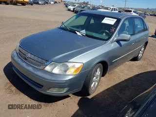 2001 Toyota Avalon XL z VIN 4T1BF28B31U150439, wystawiony jako IAAI lot #41868466 z przebiegiem 210 828 mil mil oraz . Historia ofert i sprzedaży dostępna na DreamBid. Obrazek 2.